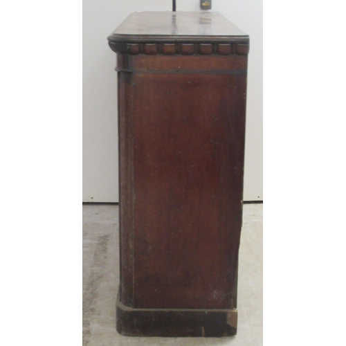 192 - A mid 19thC stained oak, open front, two tier bookcase, on a plinth   35