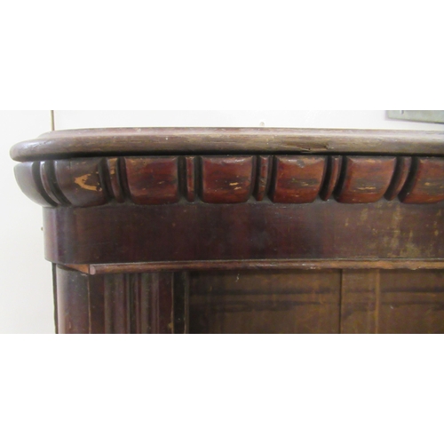 192 - A mid 19thC stained oak, open front, two tier bookcase, on a plinth   35