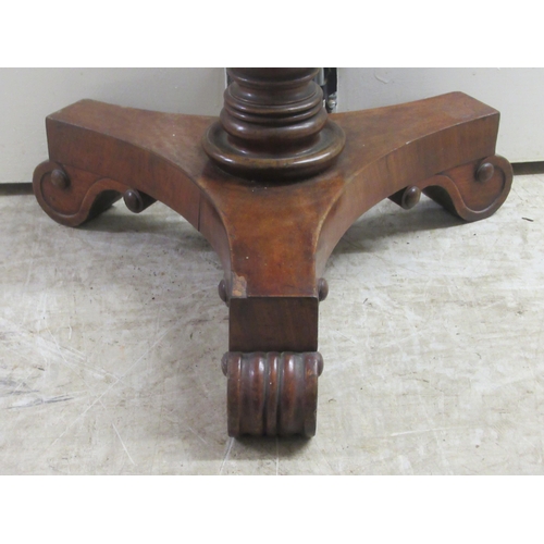 196 - A William IV mahogany framed firescreen, the rectangular framed extending top section on a turned pe... 