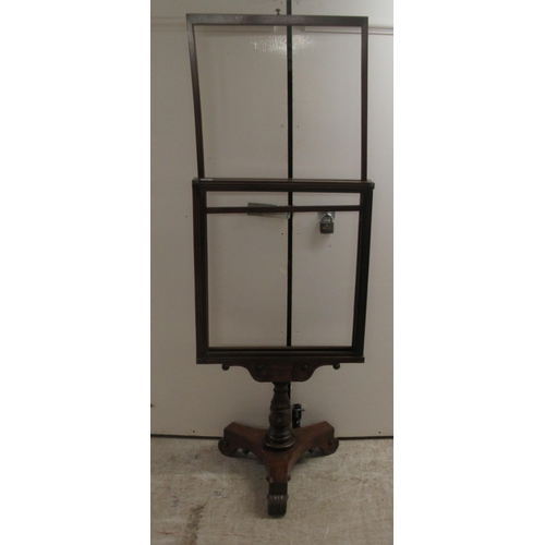 196 - A William IV mahogany framed firescreen, the rectangular framed extending top section on a turned pe... 