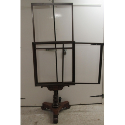 196 - A William IV mahogany framed firescreen, the rectangular framed extending top section on a turned pe... 