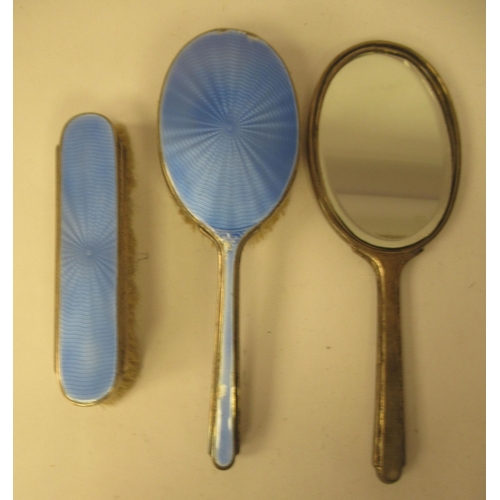202 - Edwardian and later silver capped and backed dressing table items with blue enamelled and ribbon tie... 