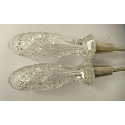 204 - A pair of late Victorian silver salad servers with cut glass handles  Chester 1886