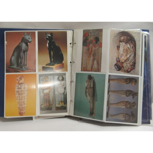 214 - An album of printed ephemera, mainly post 1950s, used postcards