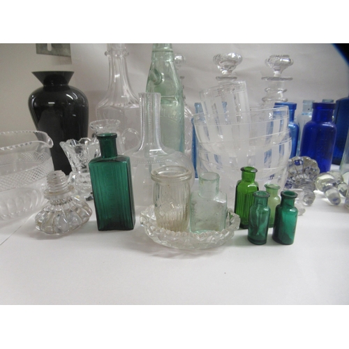 217 - Clear and coloured glassware: to include an early 20thC decanter and stopper, decorated with floral ... 