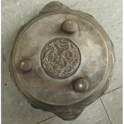 133 - A 19thC South East Asian Paktong censer of squat, bulbous form with opposing dragon handles, elevate... 