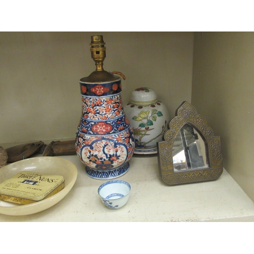 265 - A mixed lot: to include an early 20thC Japanese porcelain table lamp, decorated in the Imari palette... 