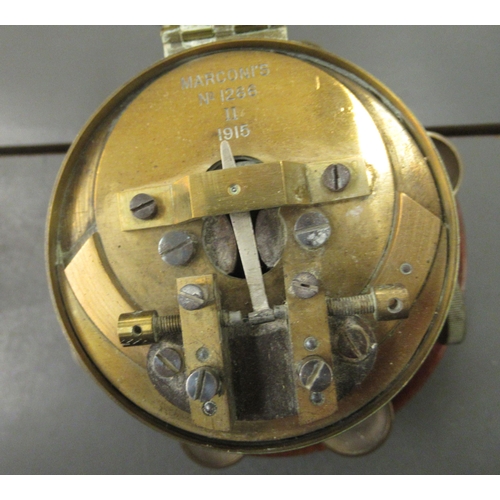 171 - Various unidentified scientific instruments: to include a 1915 Marconi lacquered brass cased tester;... 