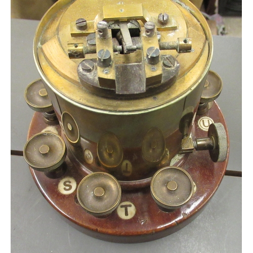 171 - Various unidentified scientific instruments: to include a 1915 Marconi lacquered brass cased tester;... 