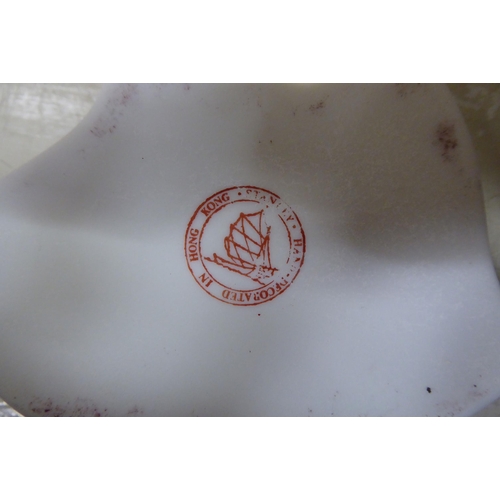 24 - A modern Chinese inspired Lazy Susan with lid, containing traditionally decorated porcelain entrée d... 