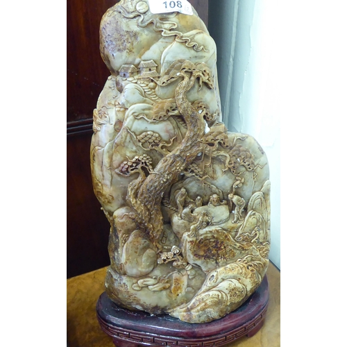 108 - Three Chinese carved soapstone sculptures: to include a mountain scene with figures  14