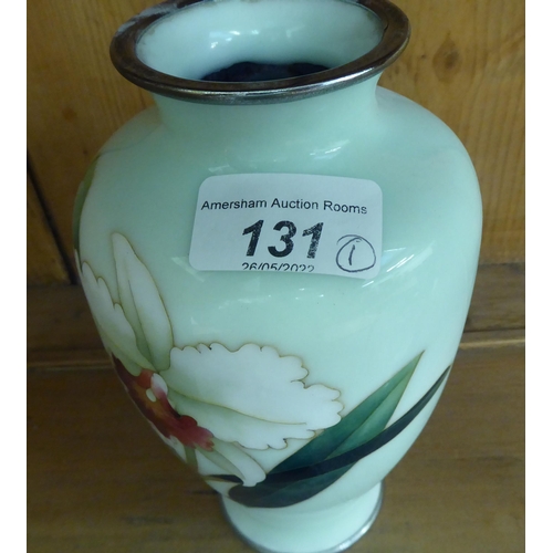 131 - A 20thC Chinese eggshell green enamelled vase, decorated with a floral sprig  7.5