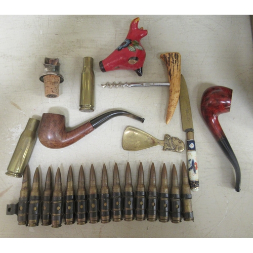 154 - Collectable items: to include replica brass bullets, cap badges and smoker's pipes