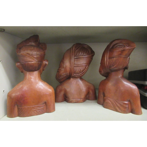 178 - Three Balinese fruitwood bust carvings  largest 9