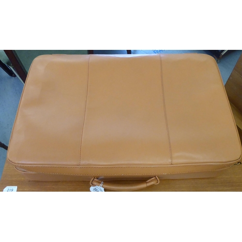 204 - A Harrods Ltd moulded and stitched pigskin, overnight case  24