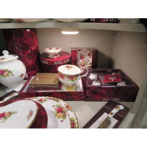 214 - Royal Albert bone china (some seconds) Old Country Rose pattern tableware, some still mint  boxed; a... 