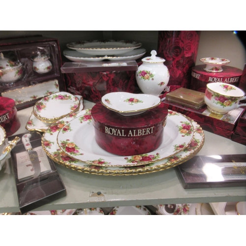 214 - Royal Albert bone china (some seconds) Old Country Rose pattern tableware, some still mint  boxed; a... 