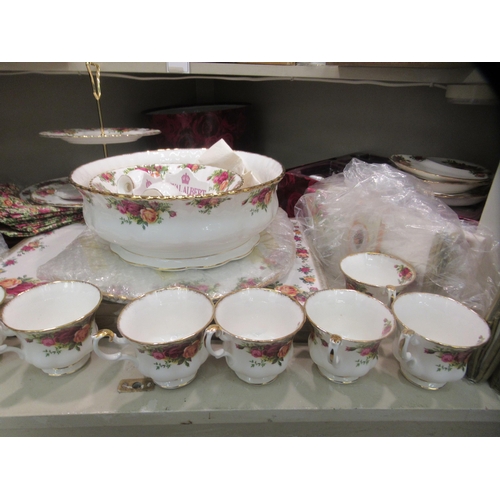 214 - Royal Albert bone china (some seconds) Old Country Rose pattern tableware, some still mint  boxed; a... 