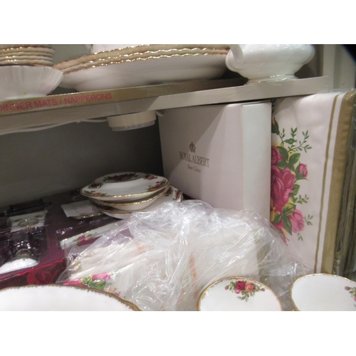 214 - Royal Albert bone china (some seconds) Old Country Rose pattern tableware, some still mint  boxed; a... 