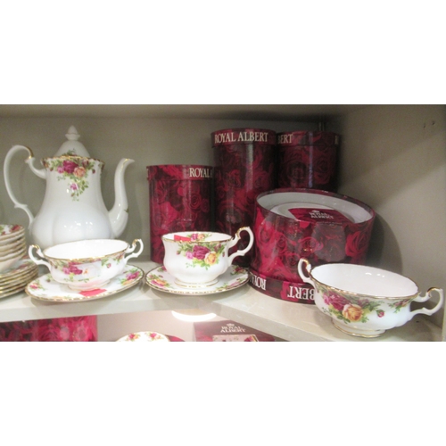 214 - Royal Albert bone china (some seconds) Old Country Rose pattern tableware, some still mint  boxed; a... 