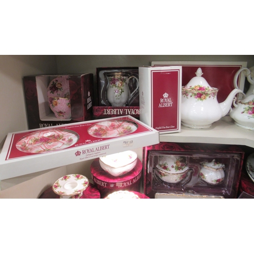 214 - Royal Albert bone china (some seconds) Old Country Rose pattern tableware, some still mint  boxed; a... 