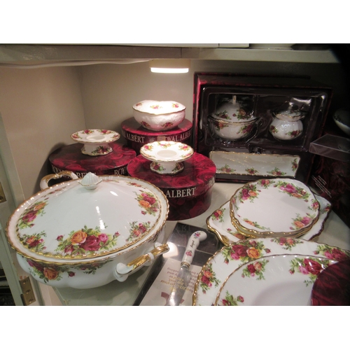 214 - Royal Albert bone china (some seconds) Old Country Rose pattern tableware, some still mint  boxed; a... 