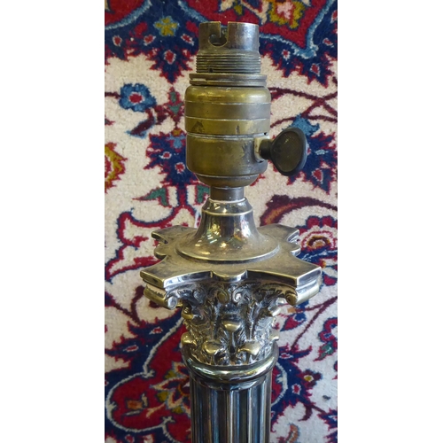 225 - A silver plated column design table lamp with a Corinthian capital, on a stepped square plinth  19