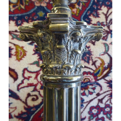 225 - A silver plated column design table lamp with a Corinthian capital, on a stepped square plinth  19