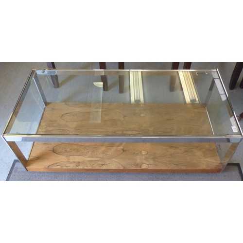 274 - A modern Merrow Associates stainless steel framed coffee table with a plate glass top and figured el... 