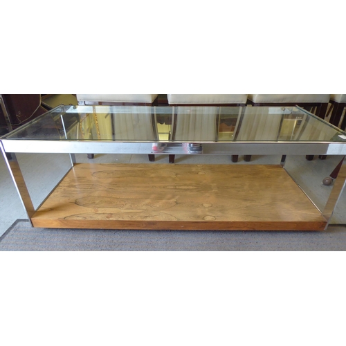 274 - A modern Merrow Associates stainless steel framed coffee table with a plate glass top and figured el... 