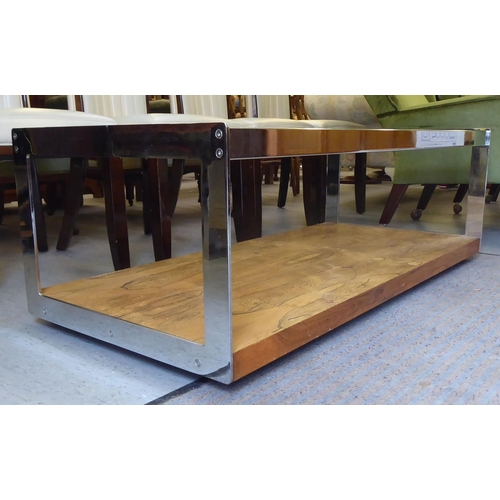 274 - A modern Merrow Associates stainless steel framed coffee table with a plate glass top and figured el... 