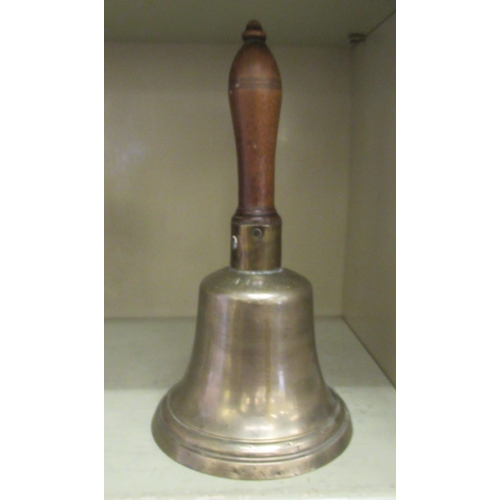 289 - A late 19thC bronze handbell, on an elliptically turned mahogany handle  13