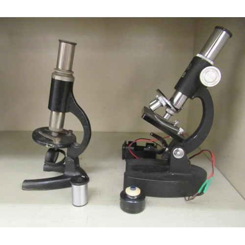 290 - A modern COC microscope with three rotating lenses; and a students microscope 