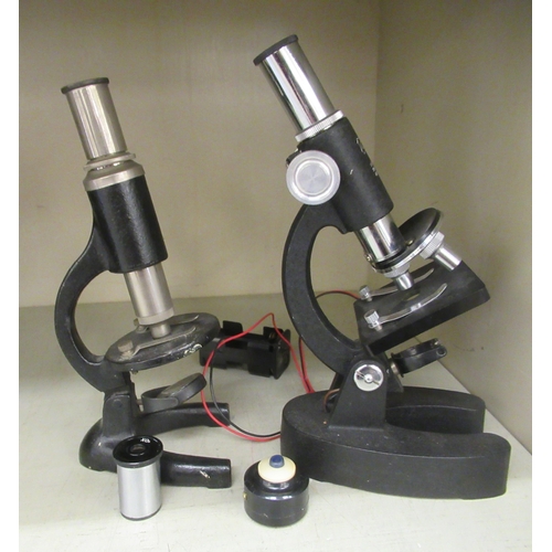 290 - A modern COC microscope with three rotating lenses; and a students microscope 