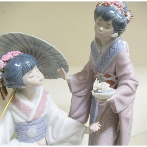 299 - A Lladro porcelain group, an Oriental scene  13