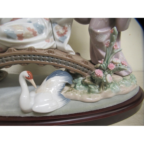 299 - A Lladro porcelain group, an Oriental scene  13