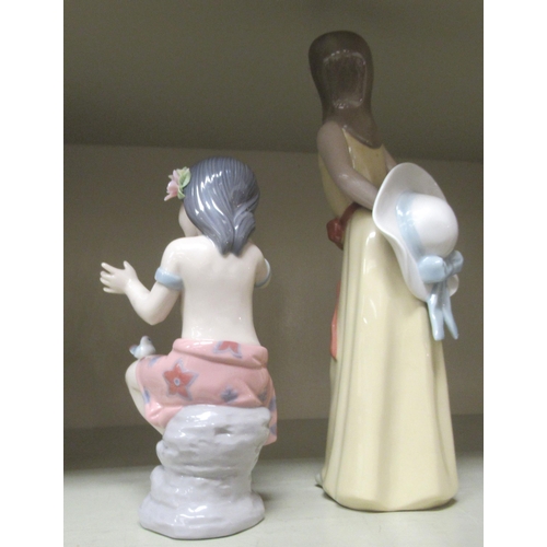 300 - Lladro, Nao and Valencia porcelain figures: to include mainly women in different poses  largest 9