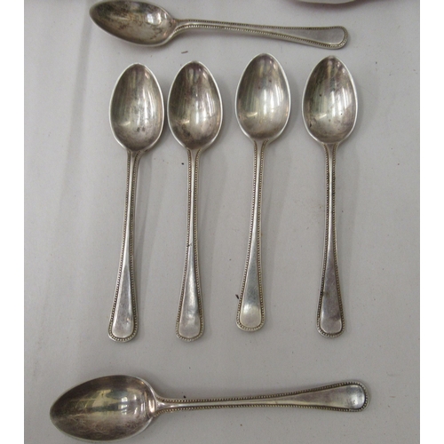 320 - A set of six silver bead pattern teaspoons  Sheffield 1919  cased 