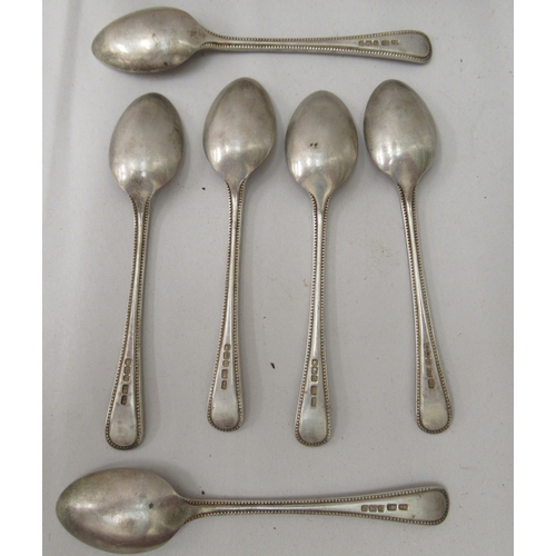 320 - A set of six silver bead pattern teaspoons  Sheffield 1919  cased 