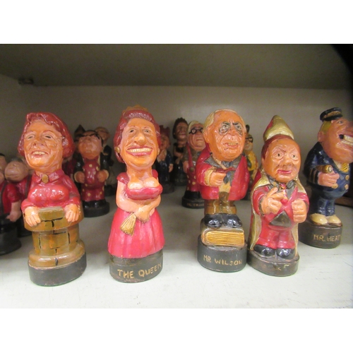 335 - A novelty painted composition group, fashioned as political figures  largest 5