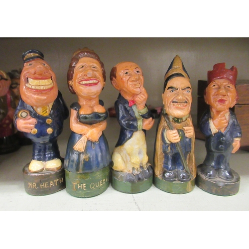 335 - A novelty painted composition group, fashioned as political figures  largest 5