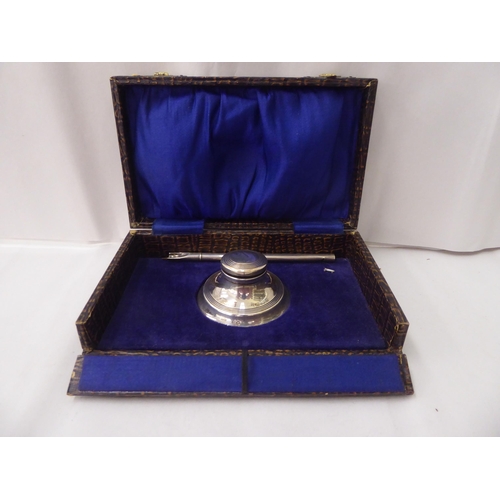 343 - A silver Capstan design inkwell  Birmingham 1925; and a Sterling silver cased pen  cased