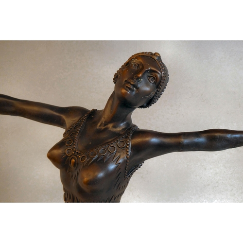 37 - A modern Art Deco style patinated bronzed metal figure, a female dancer, on a marble plinth  15... 