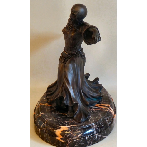 39 - A modern Art Deco style patinated bronzed metal figure, a female dancer, on a marble plinth  12... 