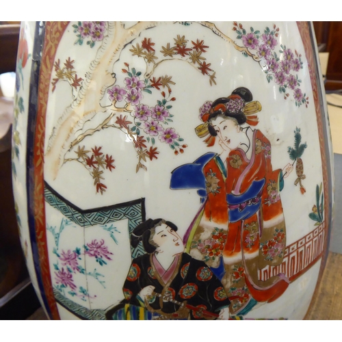 5 - Oriental porcelain: to include a 20thC Japanese vase, decorated with figures in a landscape  26