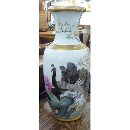 5 - Oriental porcelain: to include a 20thC Japanese vase, decorated with figures in a landscape  26