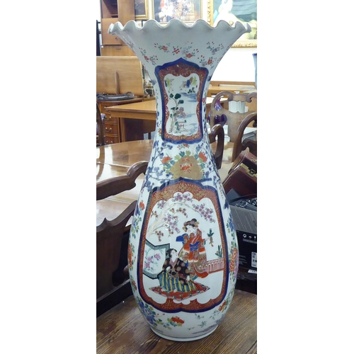 5 - Oriental porcelain: to include a 20thC Japanese vase, decorated with figures in a landscape  26