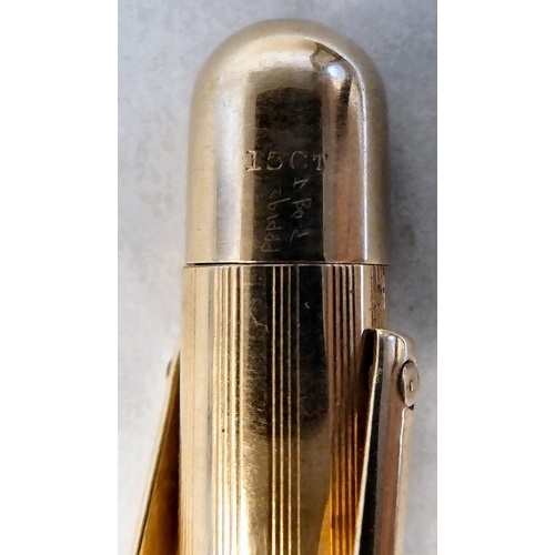 59 - A Fyne Poynt US made gold coloured metal cased propelling pencil, on a pendant ring  stamped 15ct; a... 