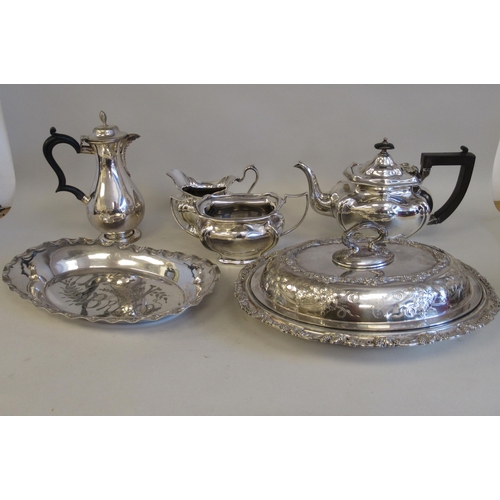 62 - Silver plated tableware: to include a three piece tea set; and an oval bread basket  12