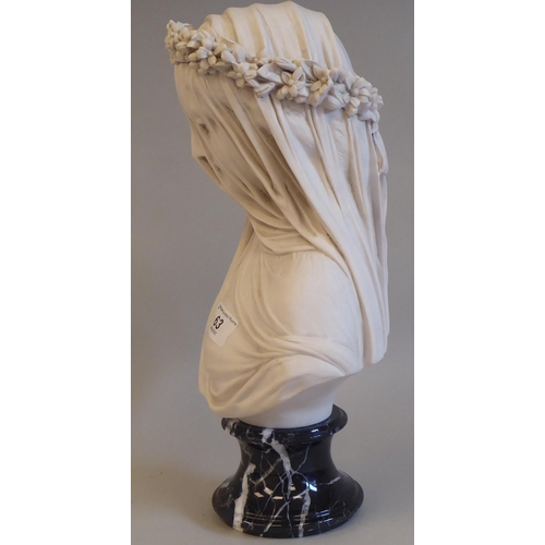 63 - After Giovanni Strazza, a modern marble effect bust, 'The Veiled Virgin' on a marble plinth  14.5